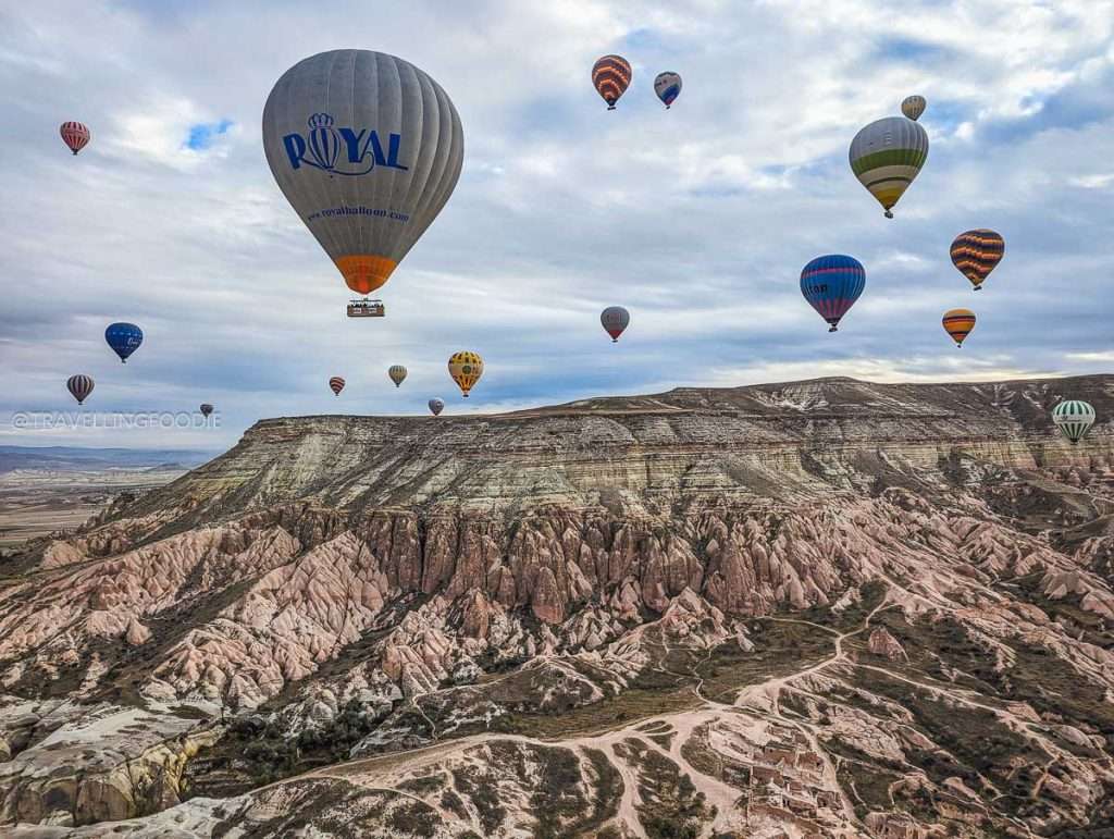 Royal Hot Air Balloon flying over Rose Valley in Goreme