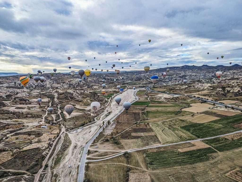 A lot of hot air balloons flying in Cappadocia