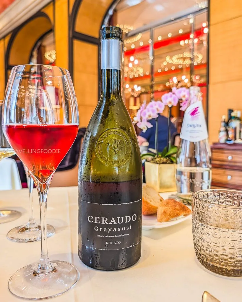 Ceraudo Grayasusi Rosato wine bottle paired with seafood course at Ristorante Acanto Milan.