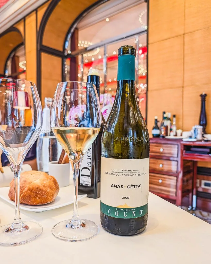 2023 Elvio Cogno Anas-Cetta white wine bottle paired with bread at Ristorante Acanto Milan.