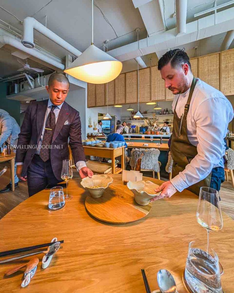 General Manager Jeremiah Tomas and Chef Jeremy Austin serving Dim Sum course at The Pine Creemore Michelin Star restaurant.