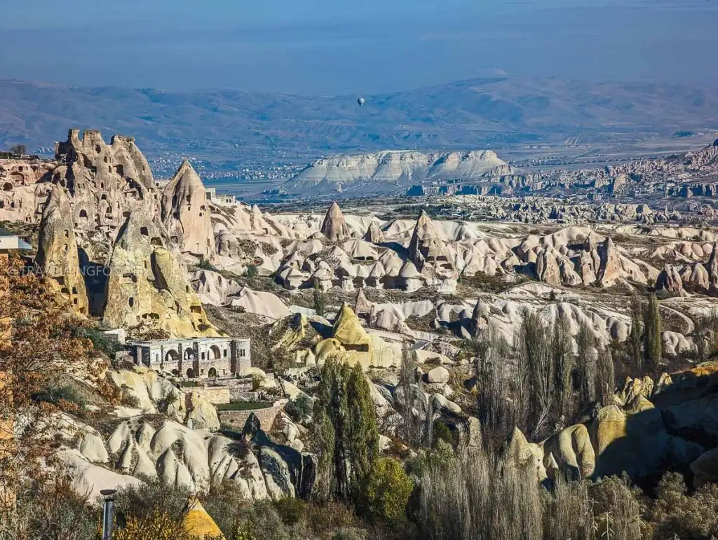 Panoramic landscape of Pigeon Valley with Uchisar Castle visible in the distance