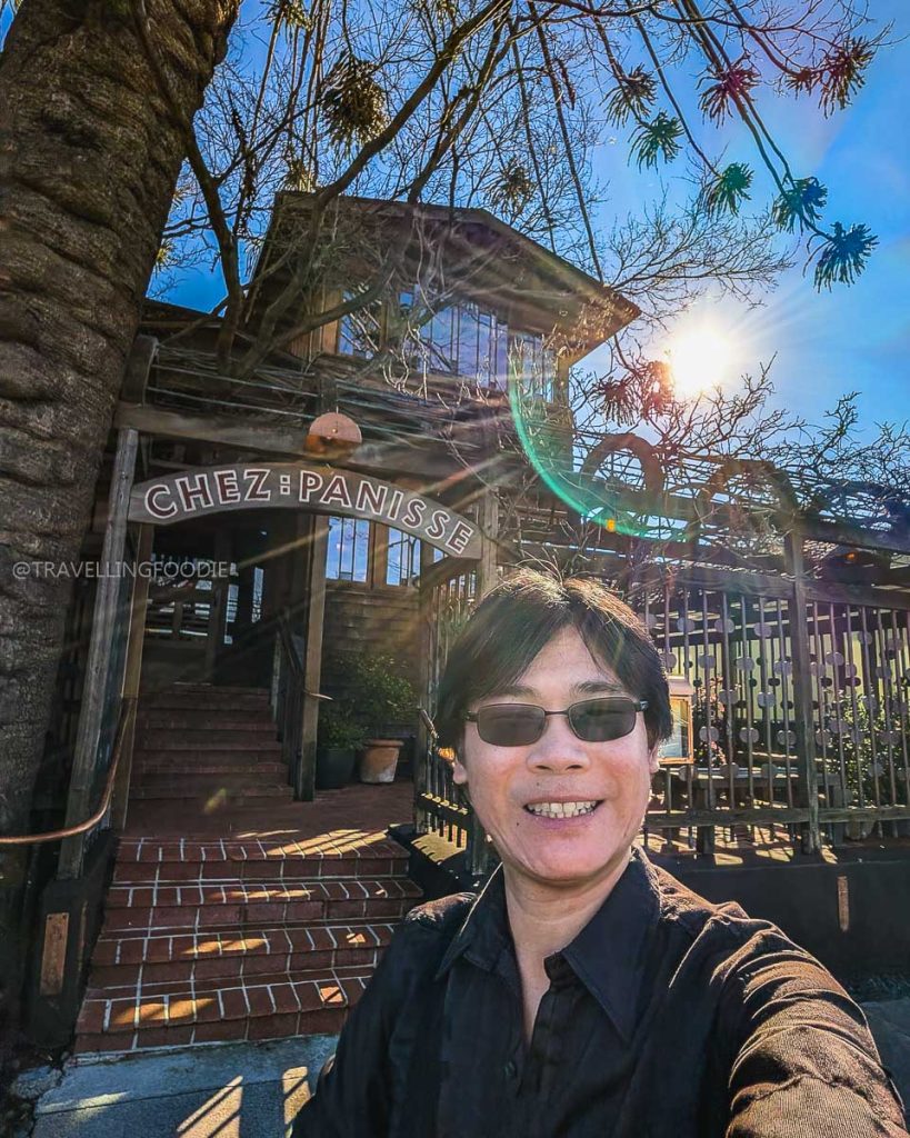 Travelling Foodie Raymond Cua standing outside the iconic Chez Panisse, one of the most famous places to eat in Berkeley, California.