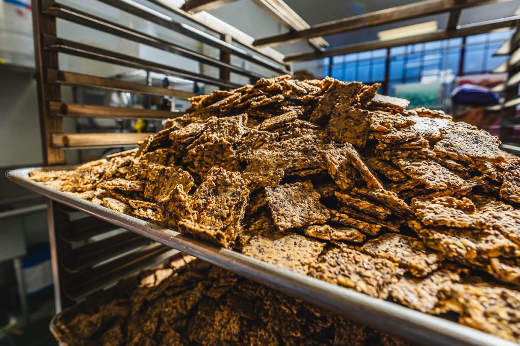 Freshly baked organic seed snacks at Cult Crackers, an award-winning specialty food business in Berkeley.