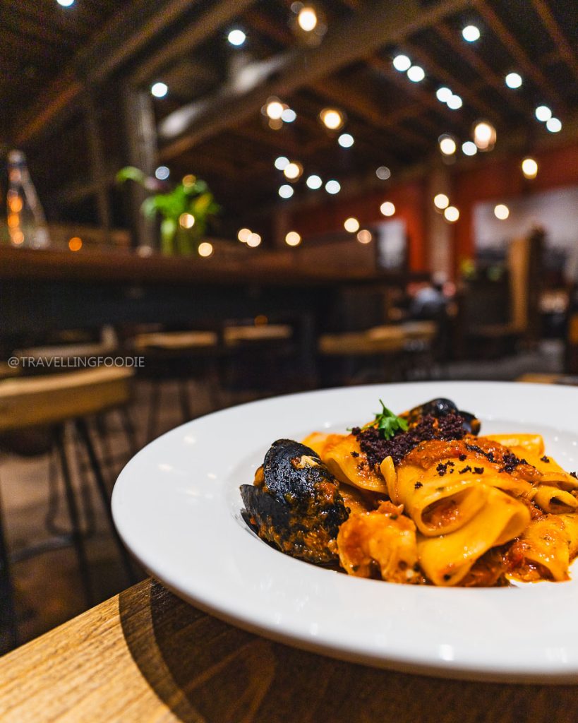 Homemade paccheri pasta with seafood at Donato and Co, an incredible Berkeley culinary experience.