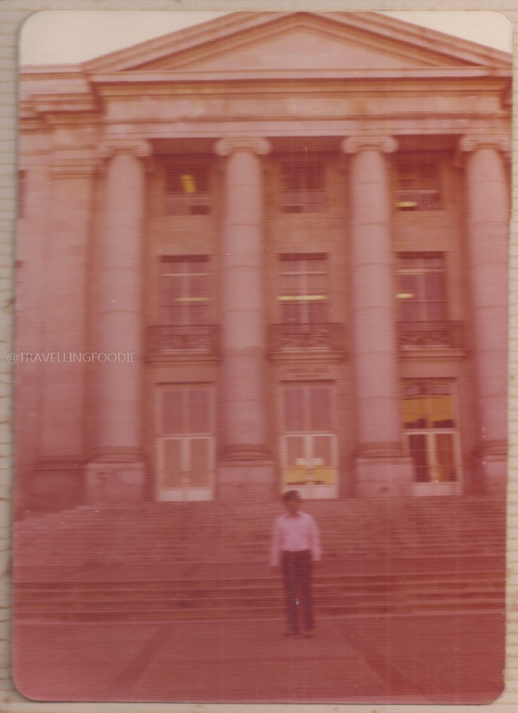 Historic vintage photo of Ernesto Cua at a UC Berkeley building, a great stop before exploring the best Berkeley restaurants.