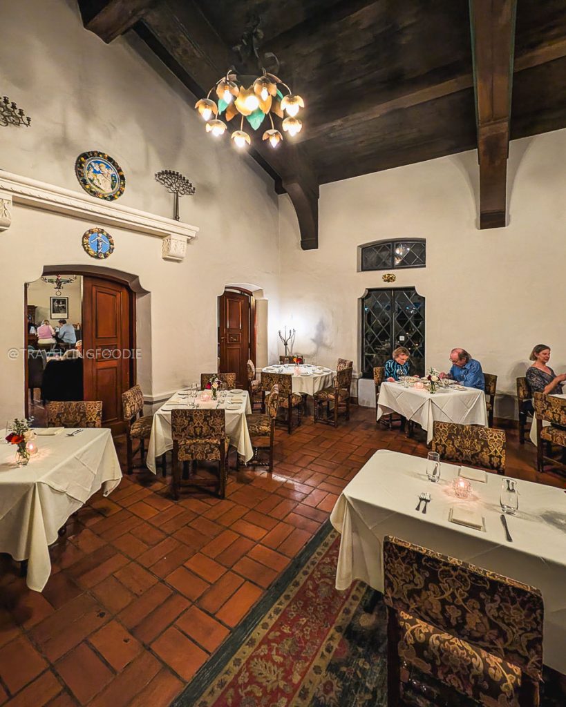 Guests enjoying fine dining under the stunning architectural ceilings of Julia's Restaurant in Berkeley.
