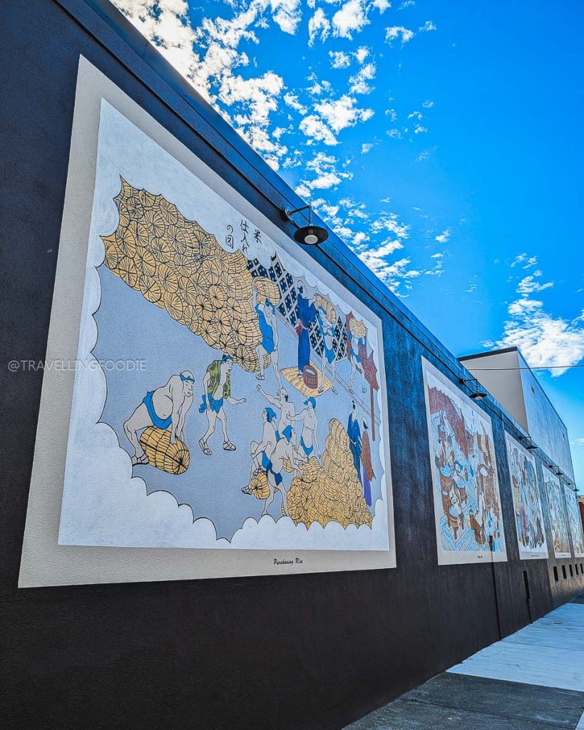 Traditional Japanese mural outside Takara Sake USA, a top spot for unique specialty food and drinks in Berkeley.