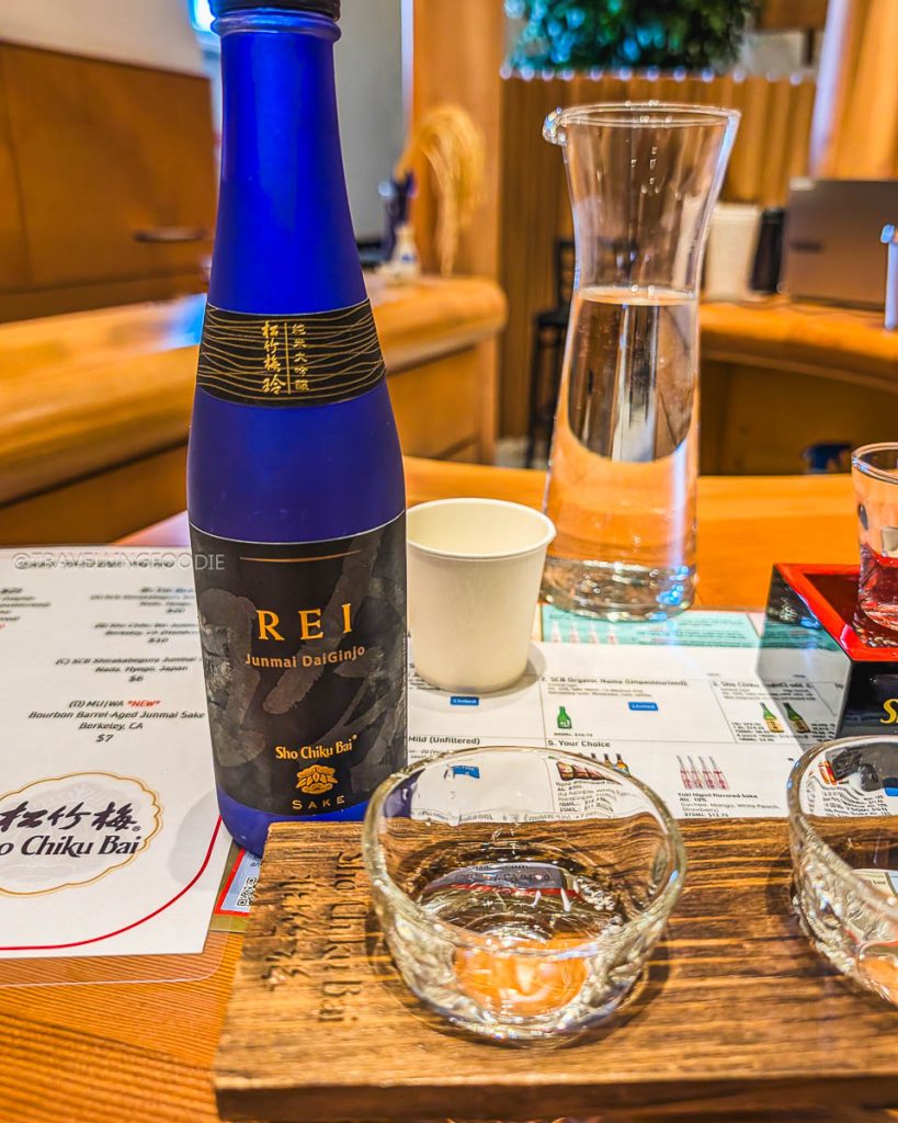 REI Junmai Daiginjo sake bottle and tasting glasses at Takara Sake, a top Berkeley drink experience.
