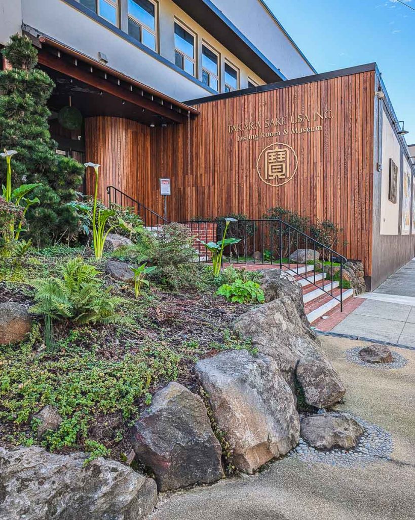 The exterior entrance to Takara Sake USA Tasting Room and Museum, an essential Berkeley culinary experience.