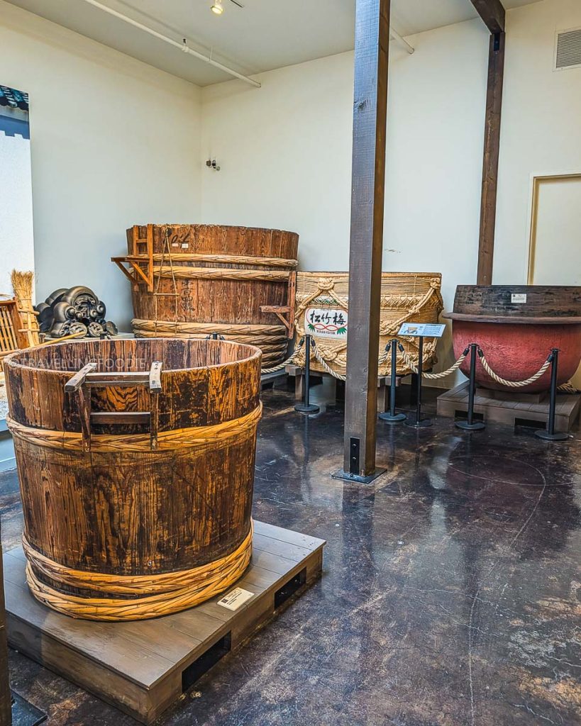 Historic wooden brewing vats inside the Takara Sake Museum, a fascinating culinary and cultural thing to do in Berkeley.