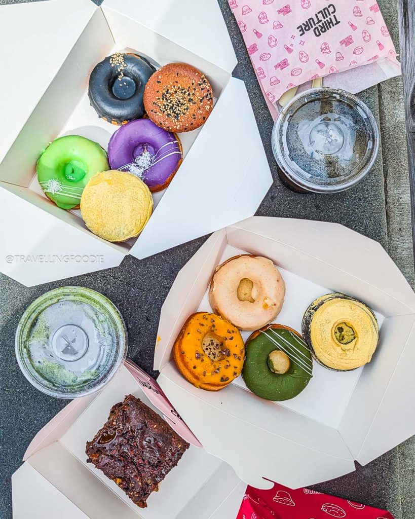 A colorful box of unique butter mochi donuts, showcasing amazing specialty food and drinks in Berkeley.