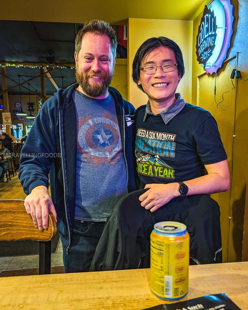 Travelling Foodie with owner Tim Carlson at The Crowbar and Grille, a top spot for Laramie food and drinks.