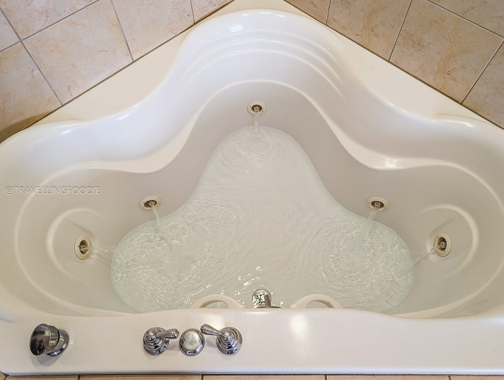 A relaxing in-room whirlpool tub at Hilton Garden Inn, perfect for unwinding after a Laramie food tour.