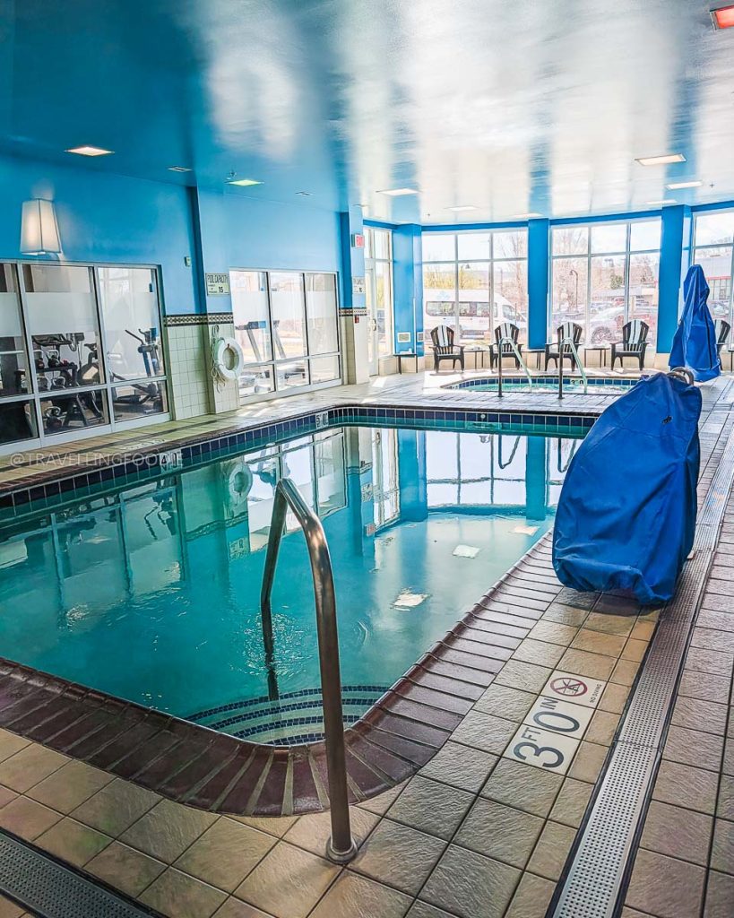 Indoor swimming pool and fitness center at Hilton Garden Inn, an ideal stay for exploring Laramie food.