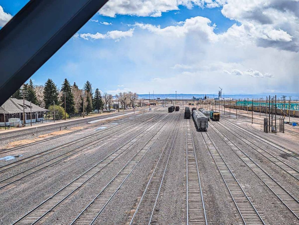 View of the train tracks from the footbridge which is a historic landmark near the best Laramie food.
