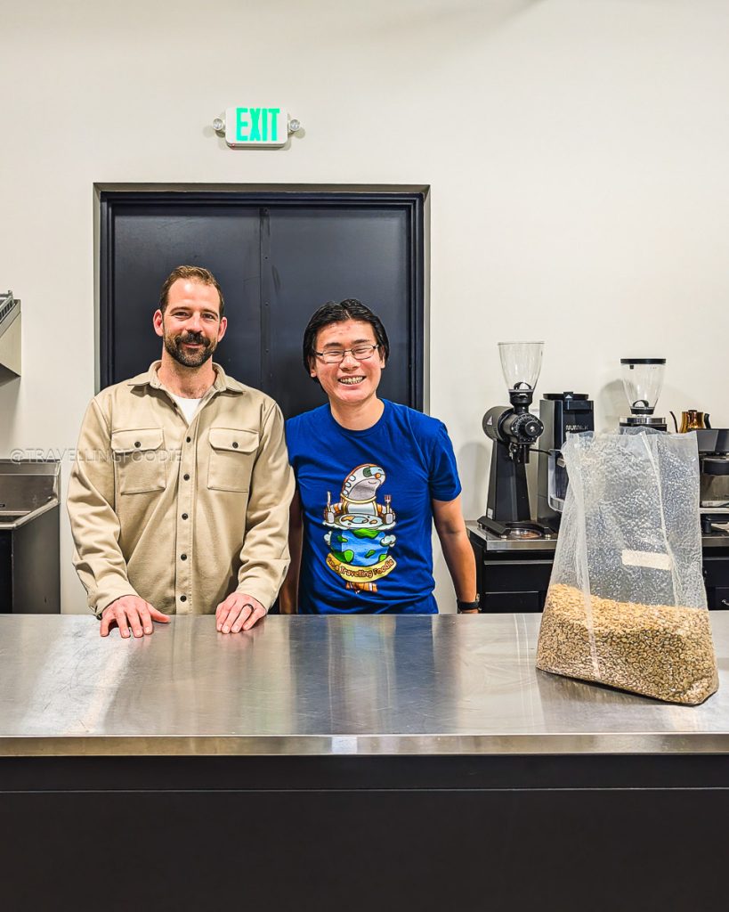Travelling Foodie hanging out with Kyle Koster at Range Coffee Roasters while exploring the best Laramie cafes.