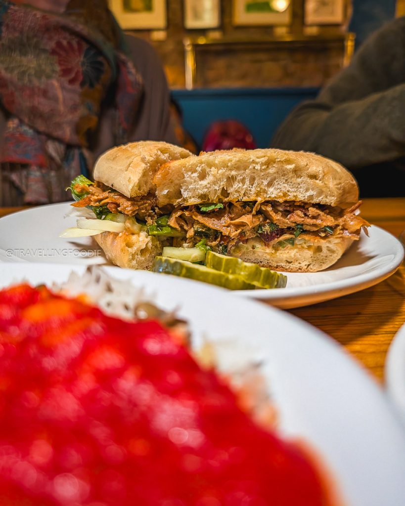 The vegan Banh Mi sandwich with seitan featured by Guy Fieri at Sweet Melissa Cafe which is one of the best restaurants in Laramie.