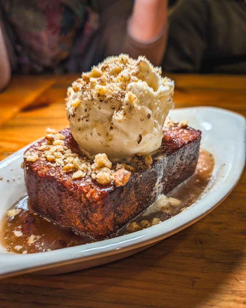Decadent fried banana bread topped with ice cream at Sweet Melissa Cafe which is a must try Laramie food.