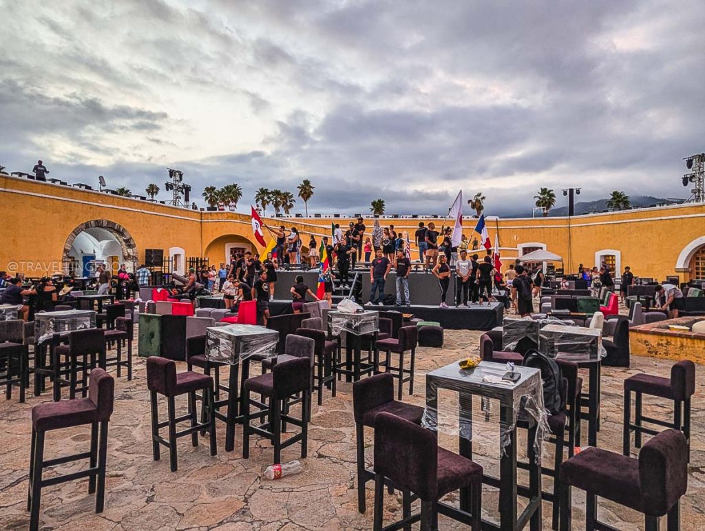 Tianguis Turistico performers preparing inside the historic Fort San Diego courtyard in Acapulco.