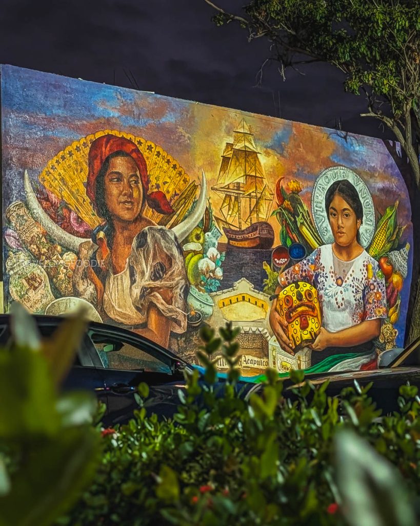 Beautiful Manila-Acapulco Galleon Trade Mural illuminated at night near Fort San Diego in Acapulco.