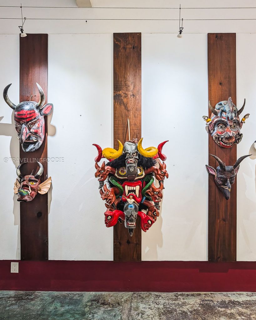 Intricate traditional devil masks showcasing rich cultural folklore on display at the Acapulco Mask Museum.