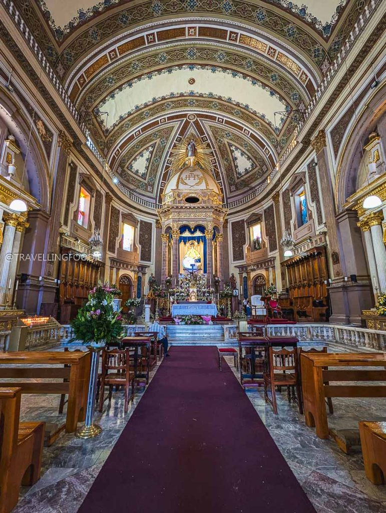 The ornate golden altar inside Patzcuaro's Basilica of Our Lady of Health to visit on a Mexico vacation.