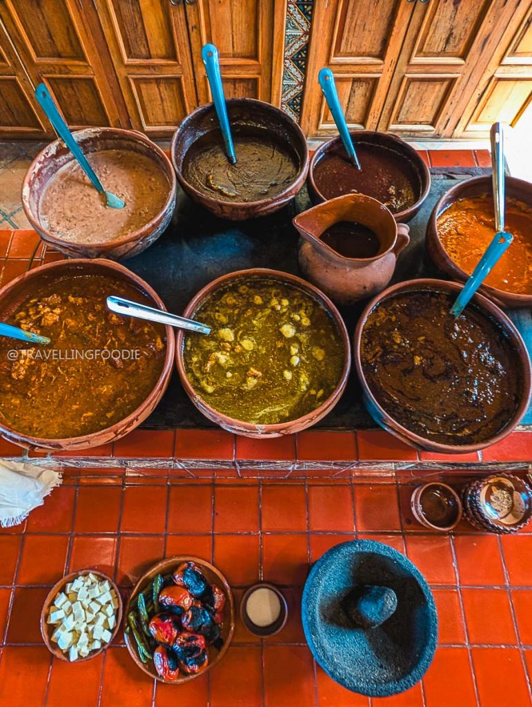 Authentic clay pots filled with local stews showcasing the best food in Michoacan.
