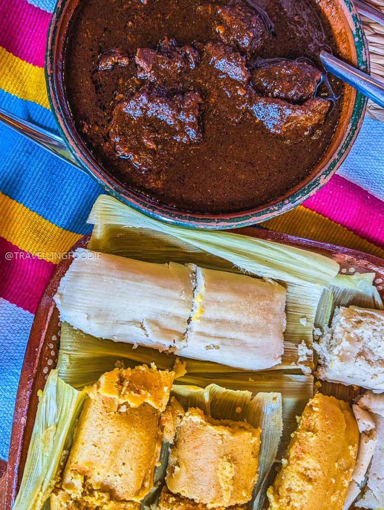 Traditional Uchepos sweet corn tamales and rich stew, showcasing the best food in Michoacan.