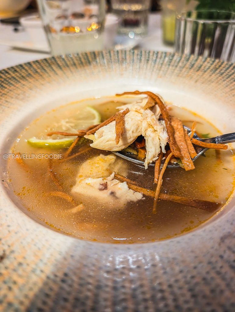 Traditional Mexican chicken soup with tortilla strips at one of the best restaurants in Michoacan.