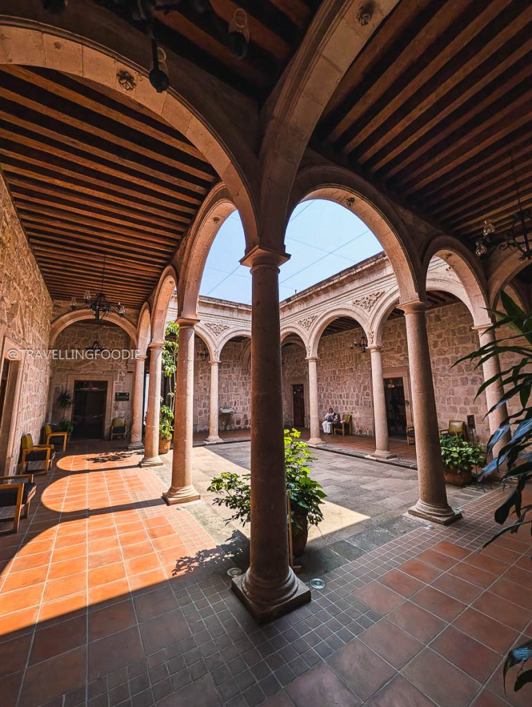 Stunning colonial architecture with stone archways, a beautiful stop on your Michoacan itinerary.