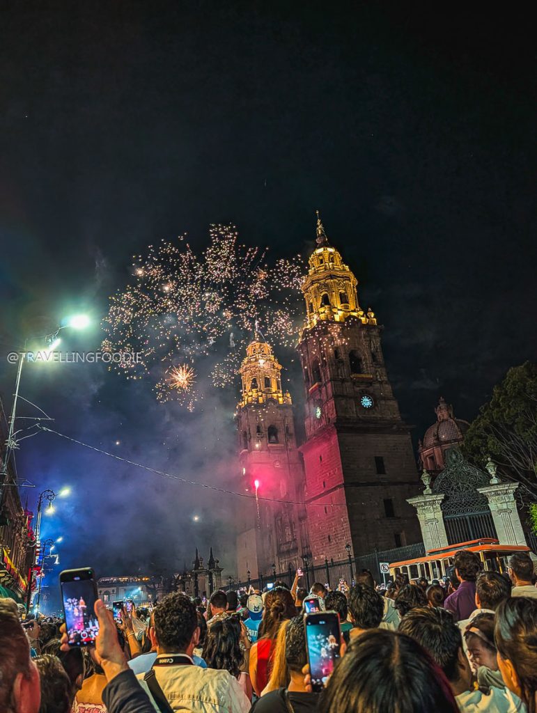 Crowd watching spectacular fireworks over Morelia Cathedral during a 3 day trip in Michoacan.