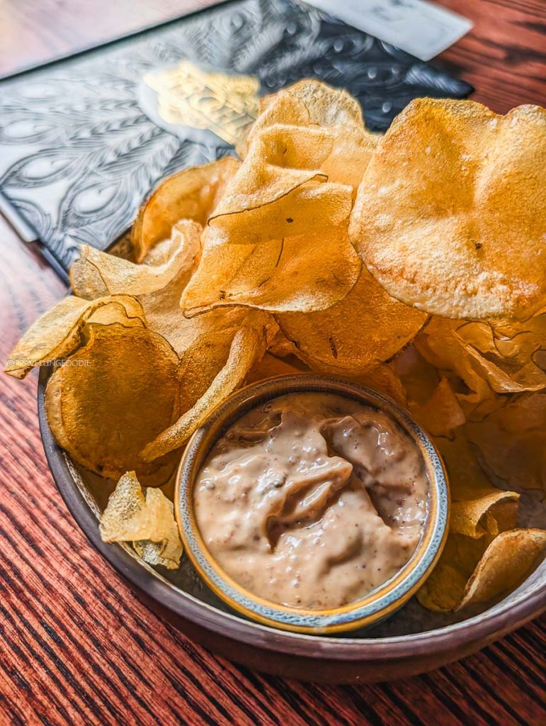 House-made kettle chips with dip for a late-night snack at Bar Ocelli Ottawa.
