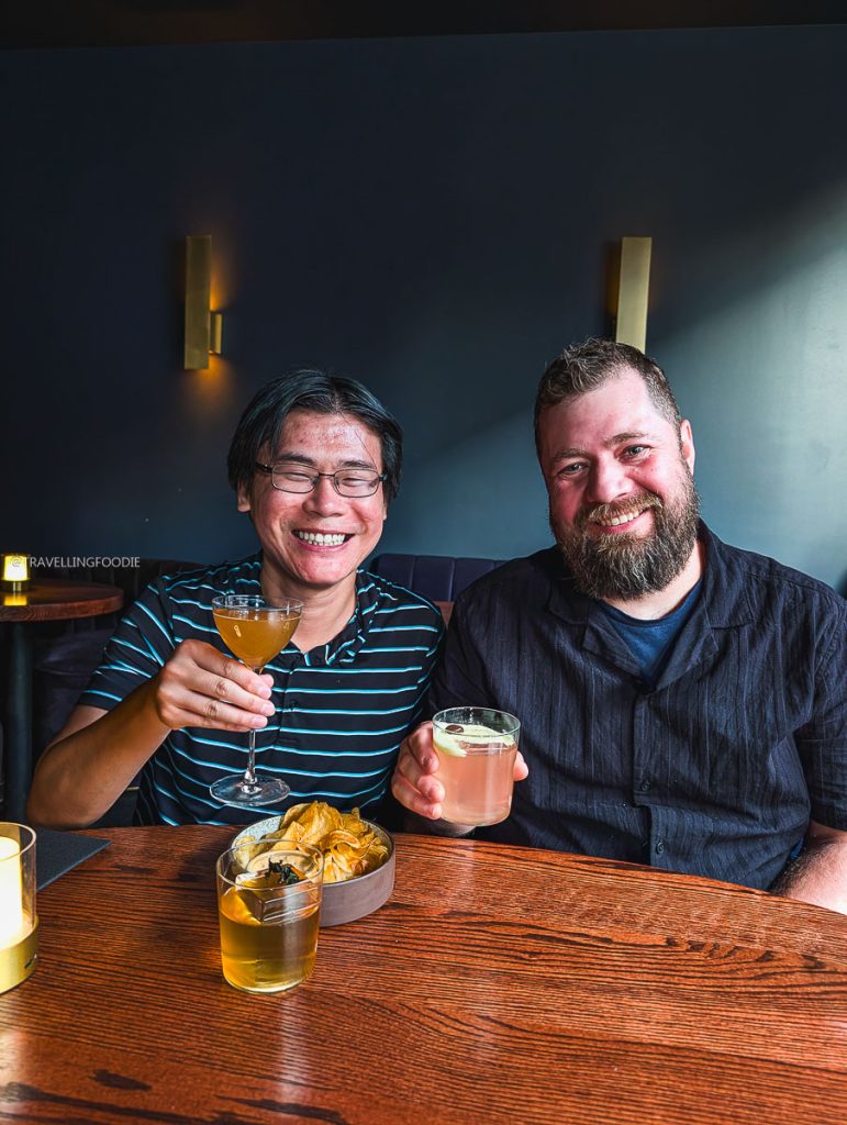 Enjoying drinks with Chef Justin Champagne-Lagarde at Bar Ocelli, a top cocktail bar in Ottawa.