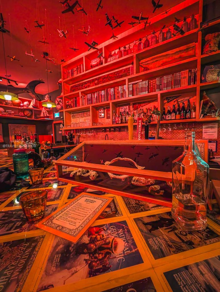 The beautifully decorated bar area inside Natural History, one of the best cocktail bars in Ottawa.