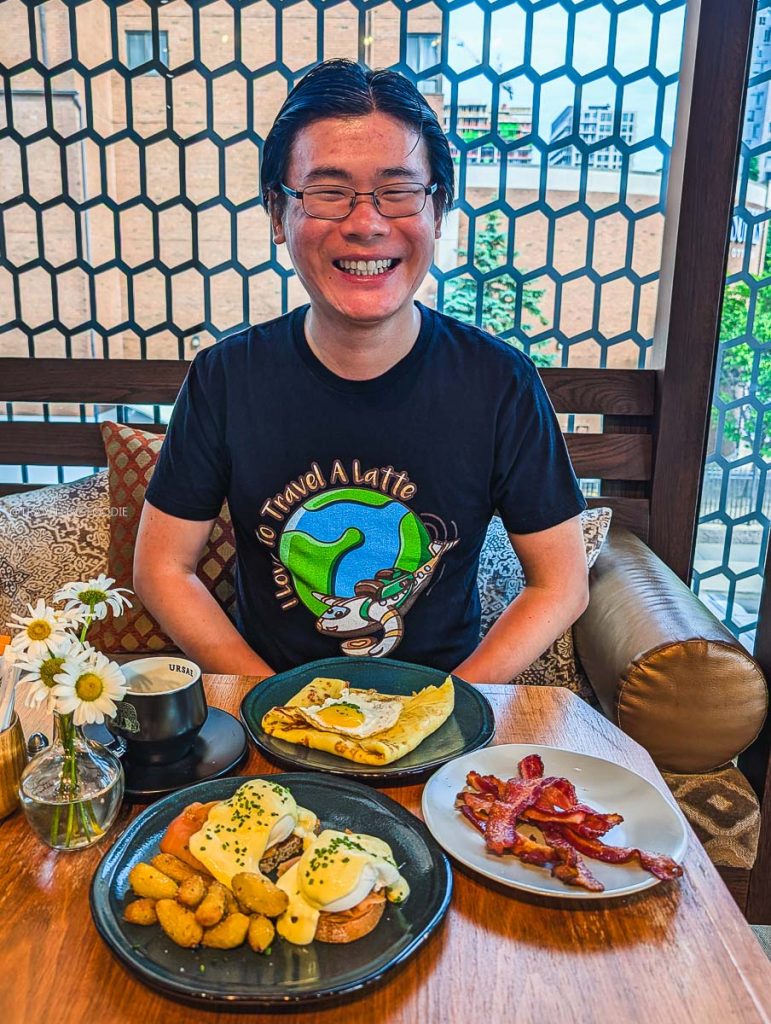 Travelling Foodie ready to enjoy a fantastic breakfast feast while exploring Ottawa food.