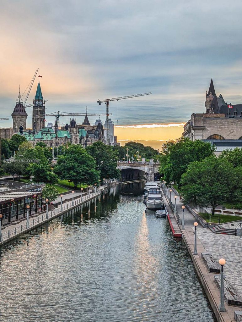 The Parliament and Fairmont Chateau Laurier with the Rideau Canal in downtown Ottawa.