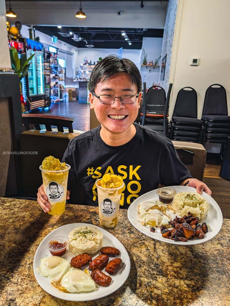 Travelling Foodie Raymond Cua enjoying authentic Filipino food and drinks at Al's Kitchen, a local Saskatoon restaurant.