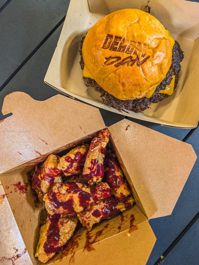 Animal Smash Burger and Burning Berry Wings from Deadly Dan's Burgers highlighting what to eat for amazing Saskatoon food.