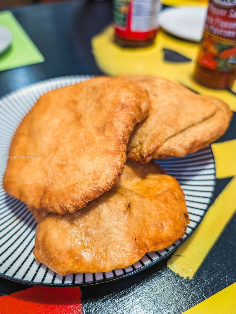 Complimentary Jamaican Johnny Cakes at Konga Cafe, highlighting authentic Caribbean Saskatoon food on the prairies.