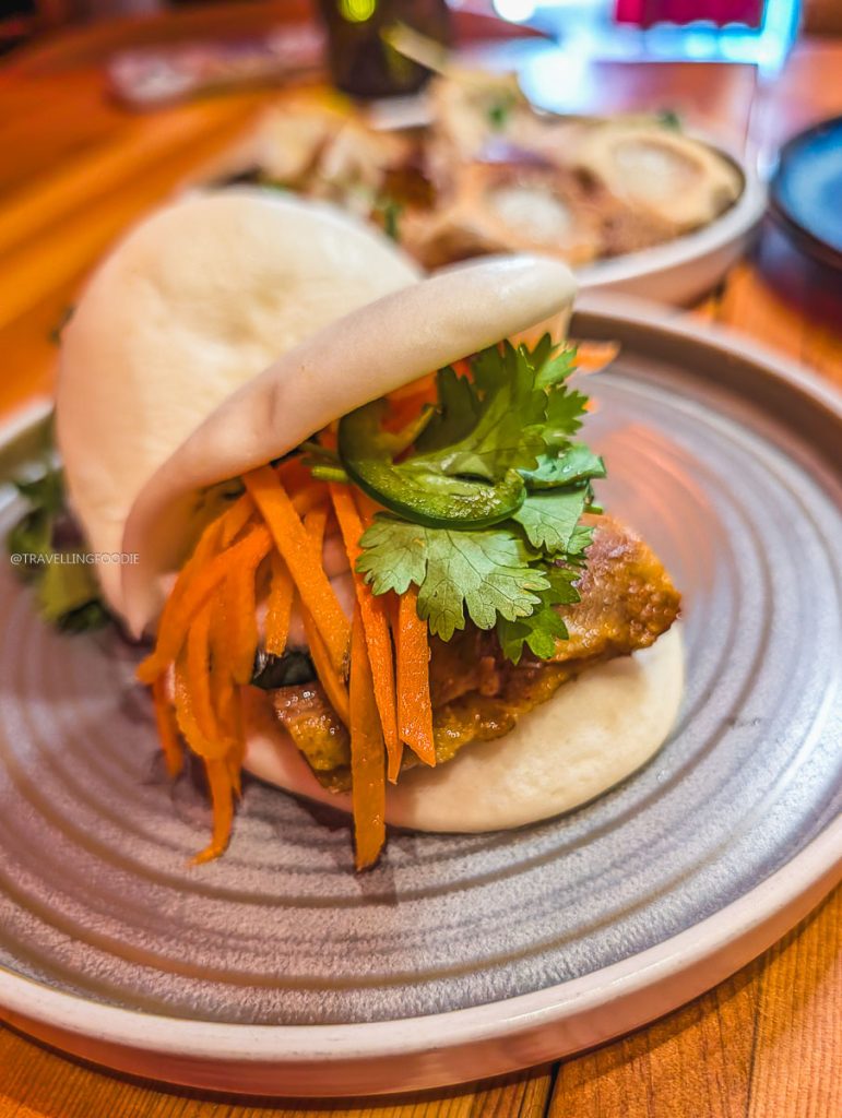 The Banh Mi Bao stuffed with pork belly at SULU Restaurant highlighting amazing local places to eat in Saskatoon.