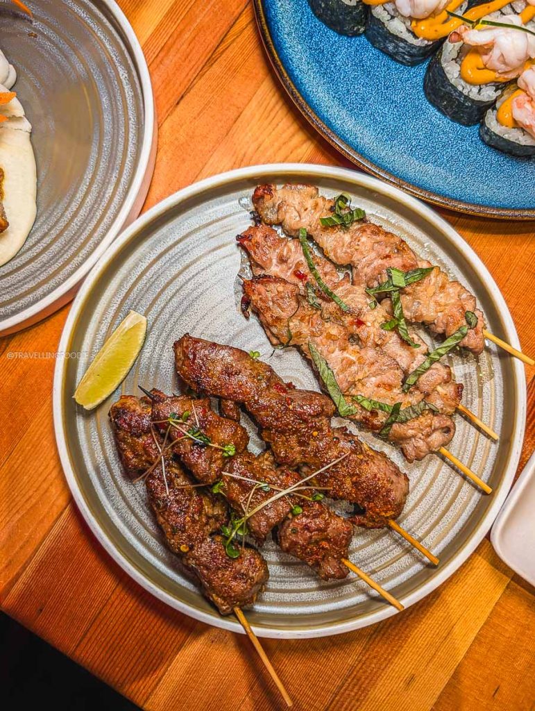 Charcoal grilled beef and pork skewers at SULU Restaurant, a highly recommended spot for where locals eat in Saskatoon.