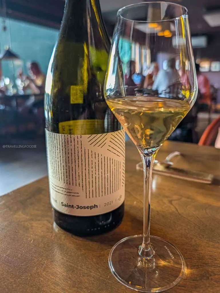 Saint-Joseph white wine pairing poured at Auberge Saint-Mathieu during our Quebec road trip