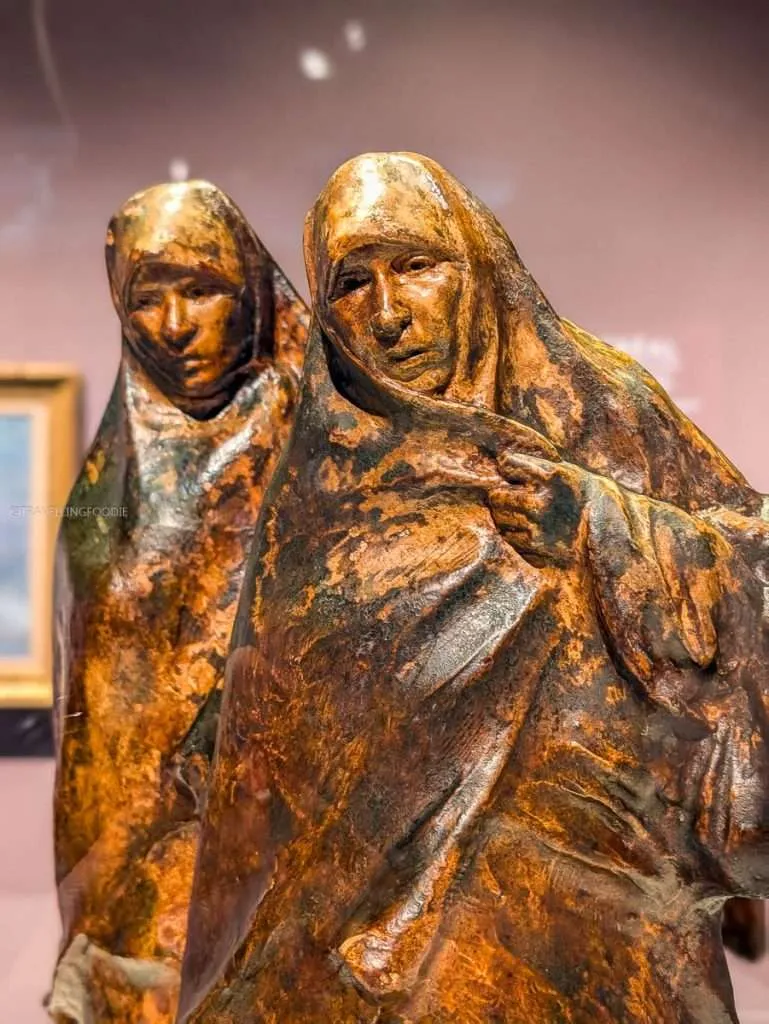 Bronze sculptures of two Indigenous figures at the Canadian Museum of History in Gatineau, Quebec.