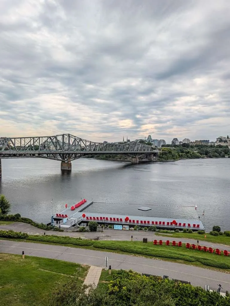 Ottawa River view and dock below Alexandra Bridge seen from the Canadian Museum of History in Gatineau Quebec.
