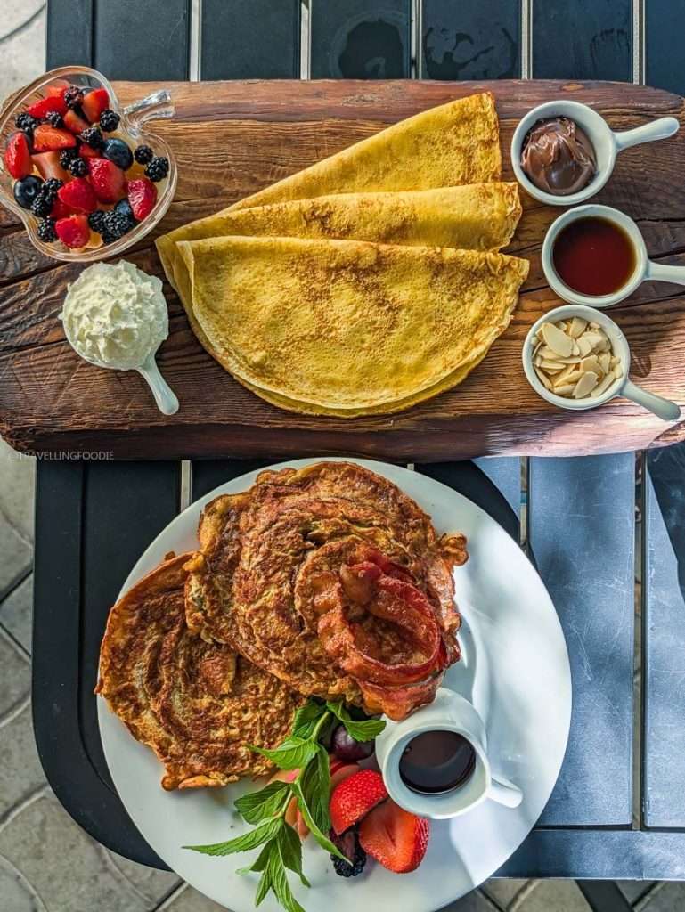 Delicious homemade crepes platter and unique French toast with bacon for breakfast at Le Cafe Entre Amis in Montebello.