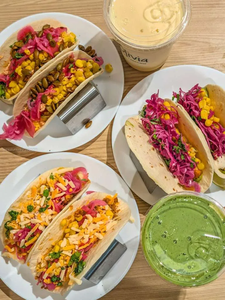A fresh spread of salmon, shrimp, and chorizo tacos with smoothies at Olivia Bistro in Chelsea Quebec